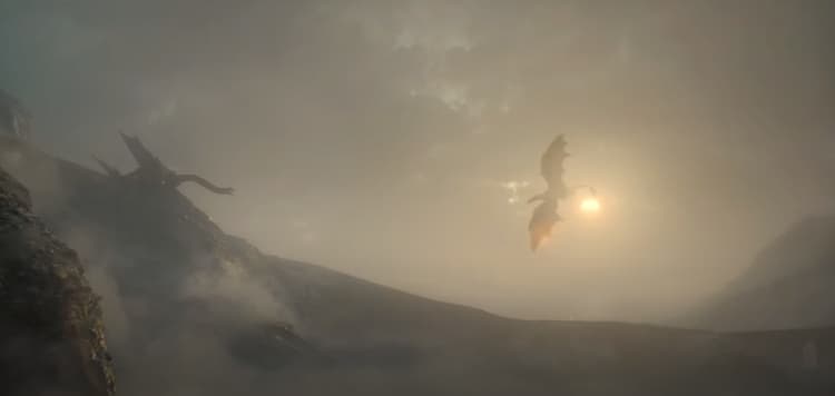 A distant silhouette of two dragons, one on a hillside and another flying toward it, the sun in the sky behind them.