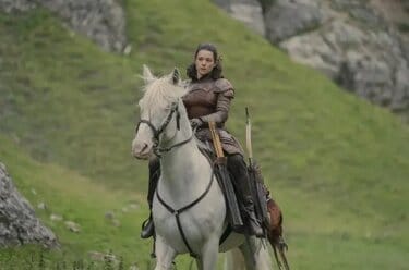 Lady Royce on horseback in the hills of the Vale.