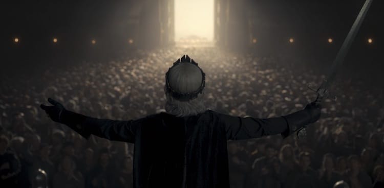 Aegon opens his arms wide to the crowd's applause.