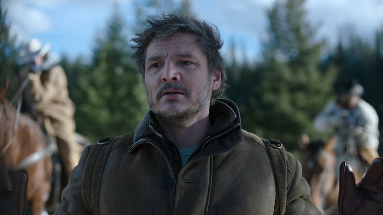 Joel looks scared as he is held up by ambushers