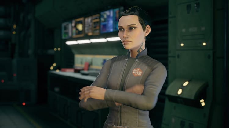 Carina Drummer stands with her arms folded