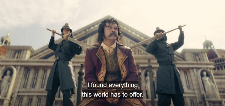 Gold Roger is on his knees while two guards have spears pointed at his back. Behind them is an extravagant building.