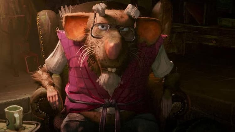 Splinter is sitting in a chair. He has a suspicious look on his face. A cup of coffee is to his right.