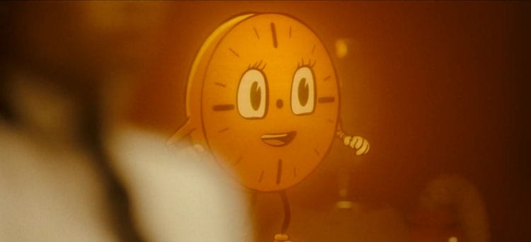 Miss Minutes has a look of enjoyment on her face. Renslayer can be partially seen to the left. They are in an orange room.