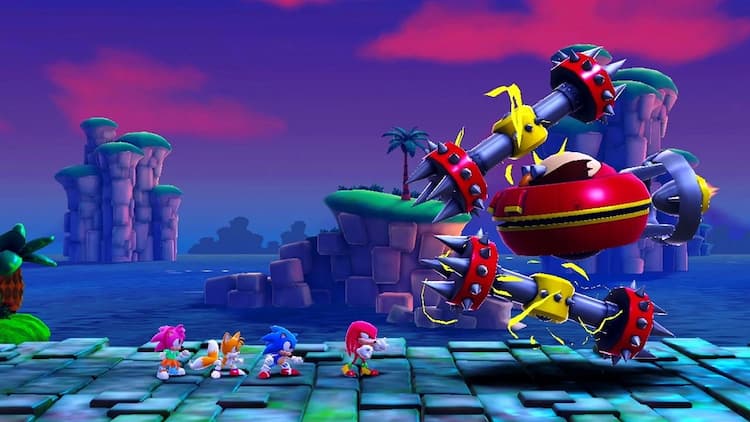 Amy, Tails, Sonic, and Knuckles are facing a giant robot created by Dr Eggman. The sky behind them is dark. The robot is a a floating head with two massive spike arms.