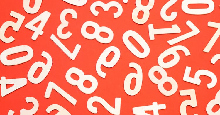 White numbers scattered on a red background