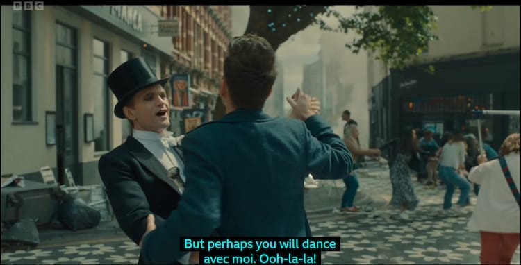 The Toymaker Dances with the Doctor in a top cat and a suit