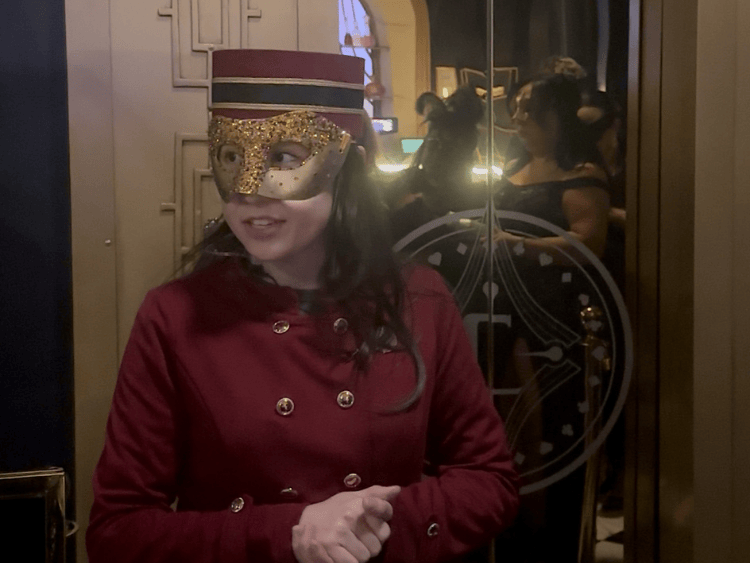 A bellhop at The Continental during The Masquerade