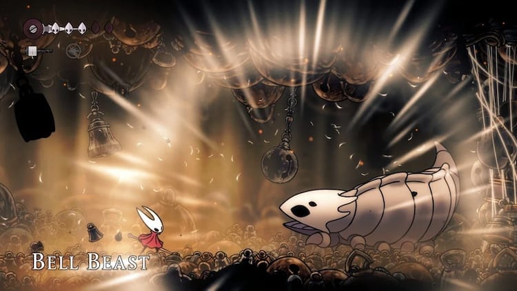 Hornet encounters the Bell Beast boss fight.