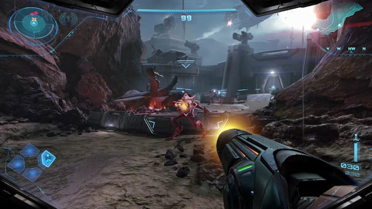 Demo gameplay. Samus's arm canon is on the right. She is charging up a shot to shoot at an enemy. Various HUD elements are around the edges of the image. A large facility is in the background.