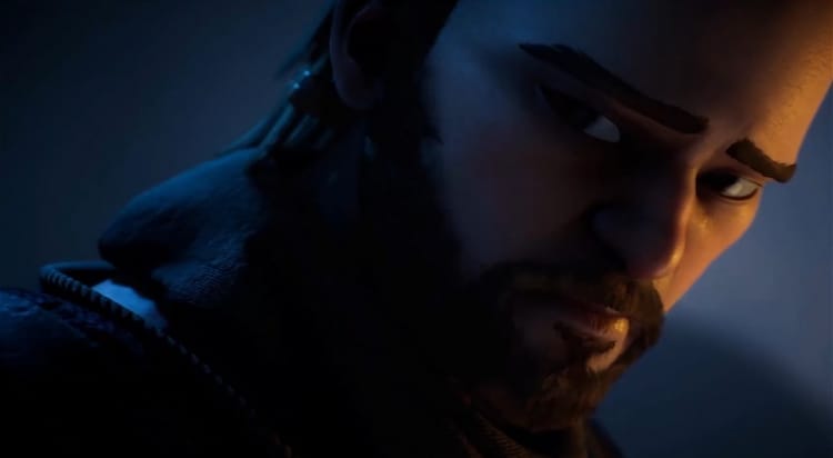 Toshi is looking at the camera over his right shoulder