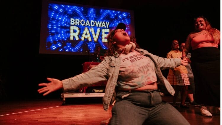 Attendee at Broadway Rave singing