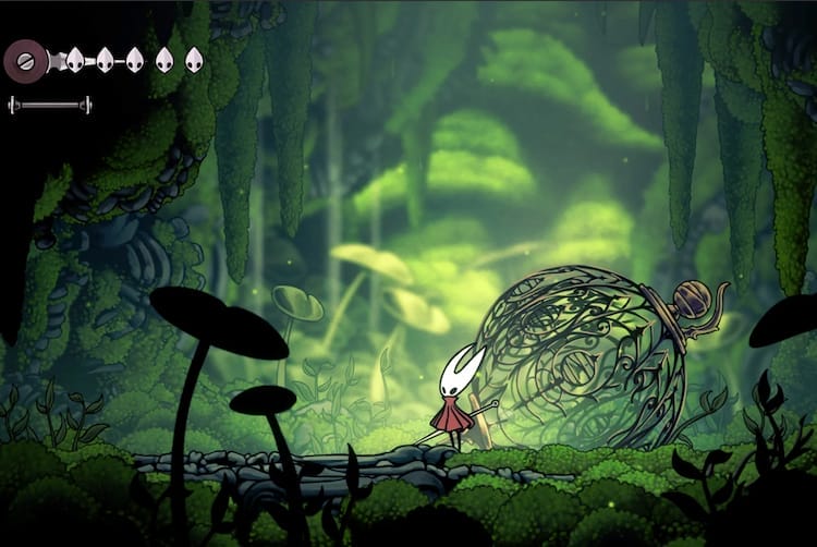 Hornet stands in a mossy area beside a broken cage.