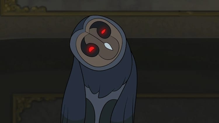 An owl with red eyes is cocking its head to its right.