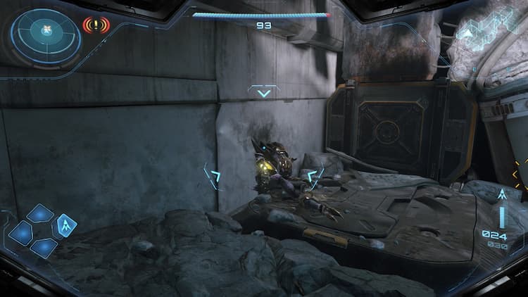 Screenshot of enemy laying wounded shooting at Samus.