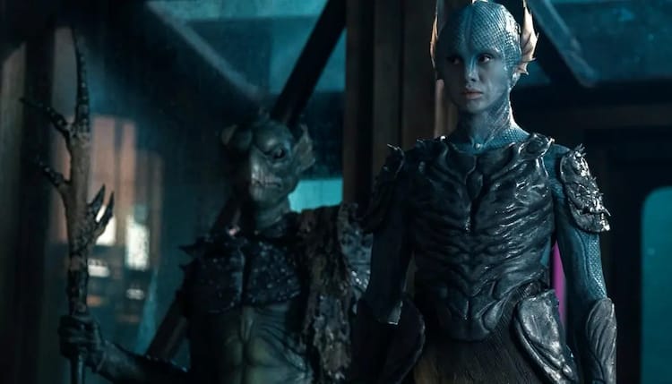 Salt, right, stands in front of another Homo-Aqua, left.